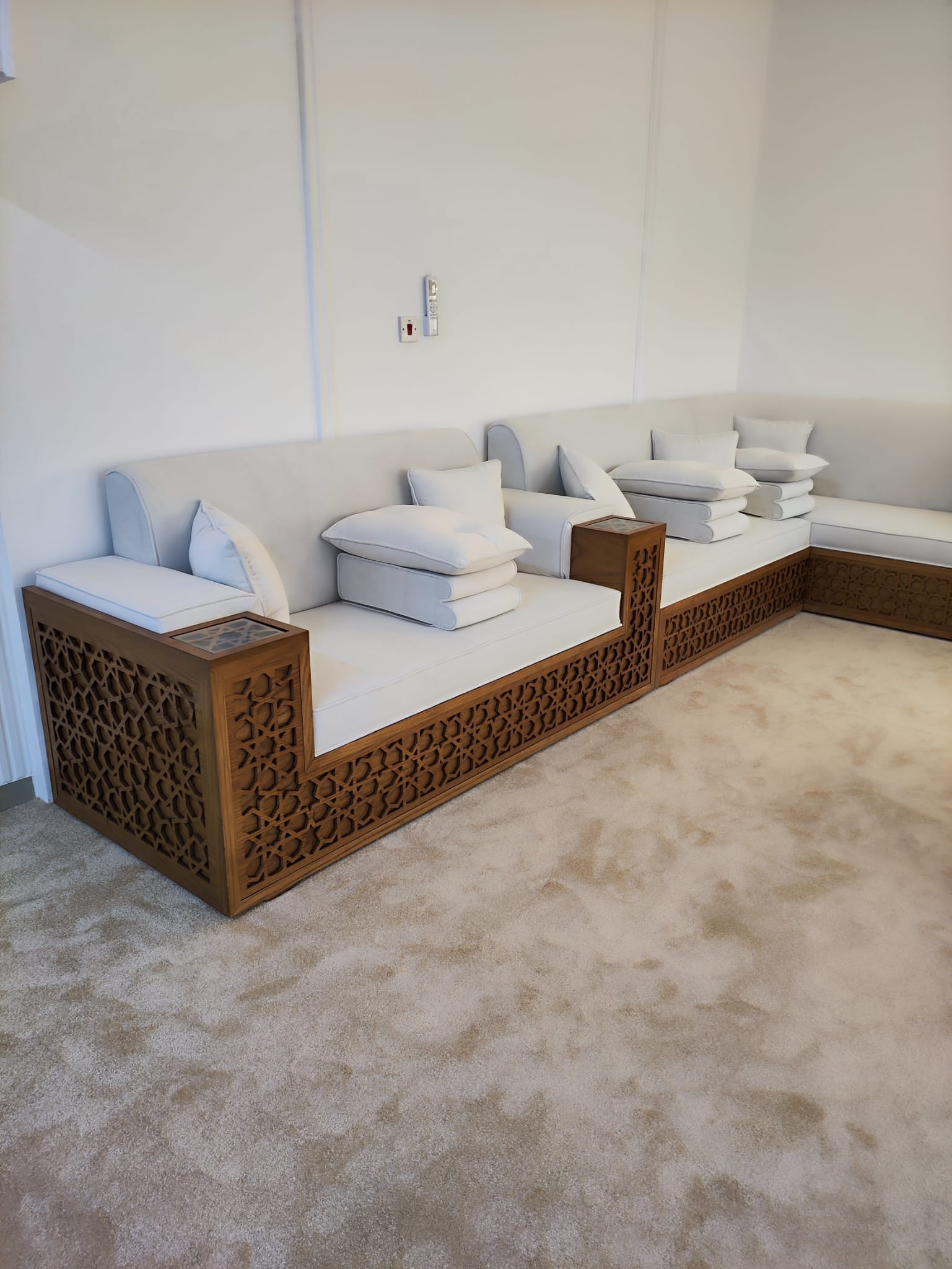 Majlis sofa and matching fitted cabinets in a Doha majlis (view 2)